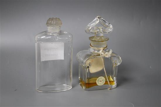 A Coty glass perfume bottle with frosted stopper, height 12cm, and a Guerlain Mitsouko perfume bottle, height 12cm